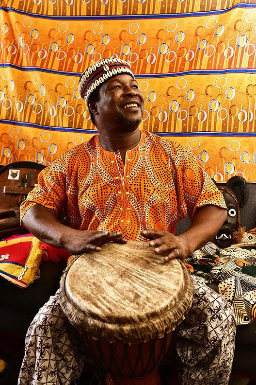 African man playing drum
