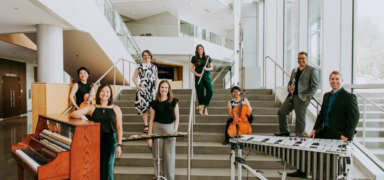Musicians with instruments on stairs