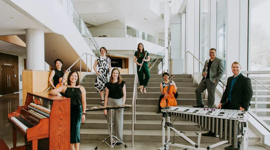 Musicians with instruments on stairs