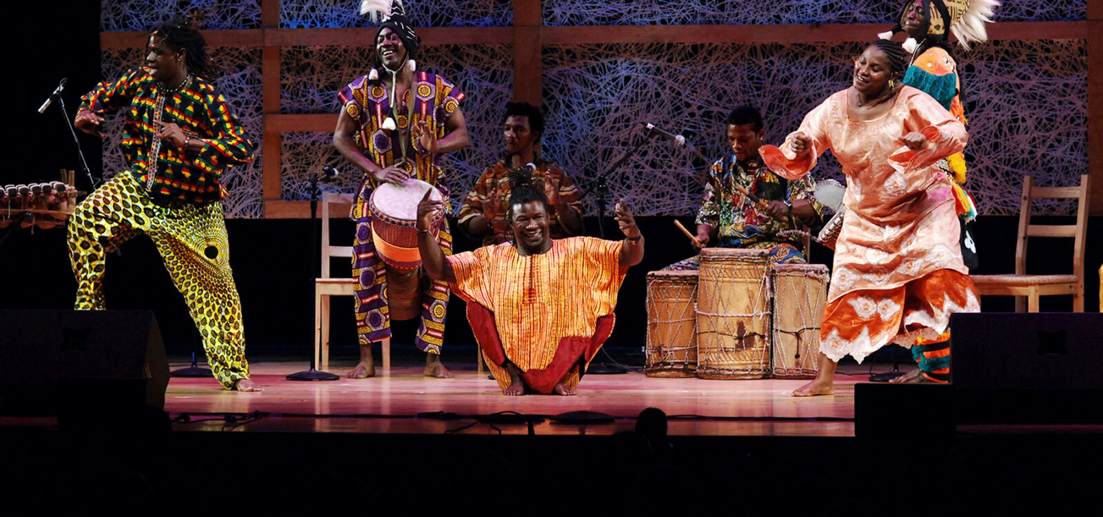 African music group playing and dancing on stage