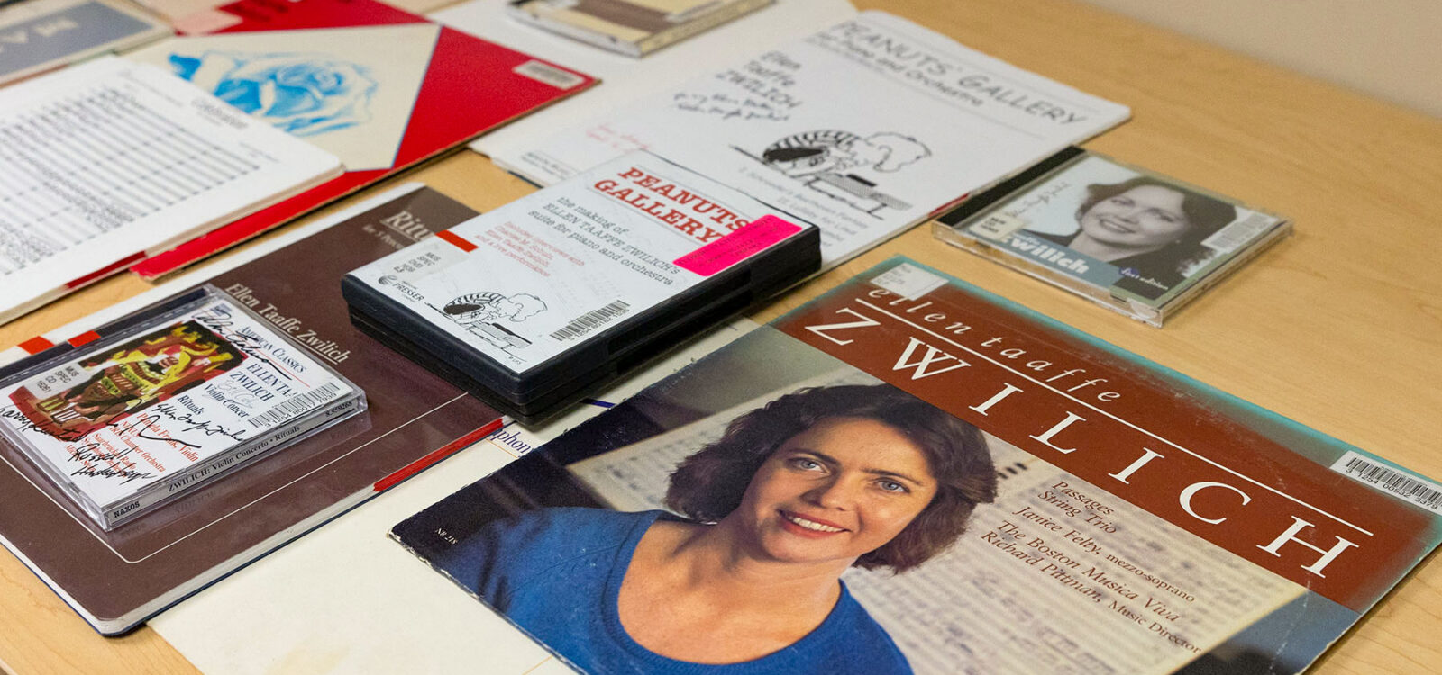 CDs, scores, and DVDs of music by Ellen Taaffe Zwilich displayed on a table in the Warren D. Allen Music Library in the FSU College of Music.