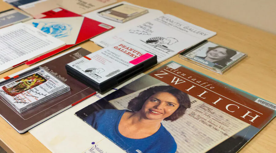 CDs, scores, and DVDs of music by Ellen Taaffe Zwilich displayed on a table in the Warren D. Allen Music Library in the FSU College of Music.