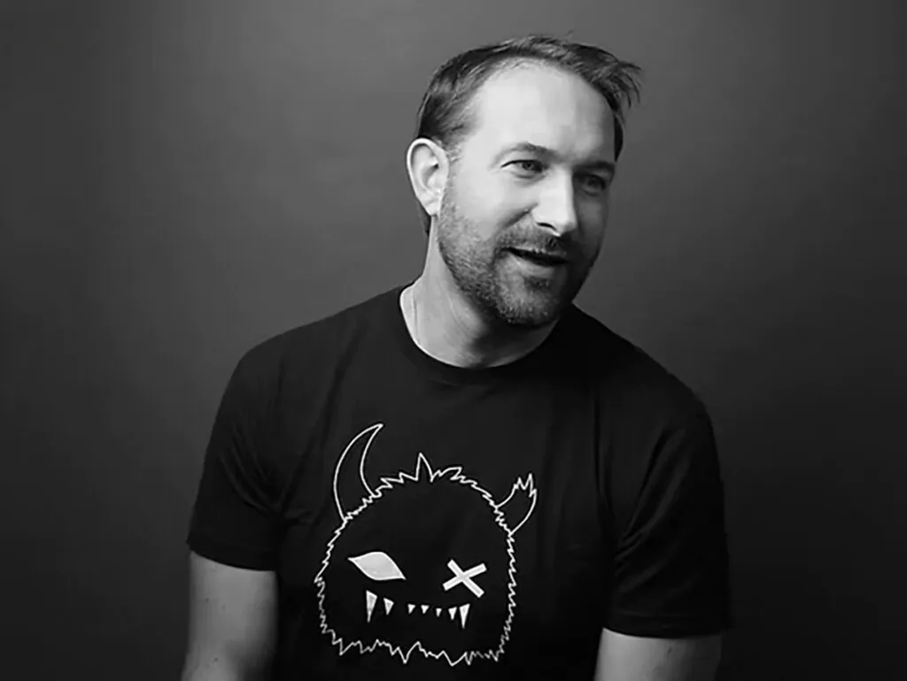black and white photo of smiling man
