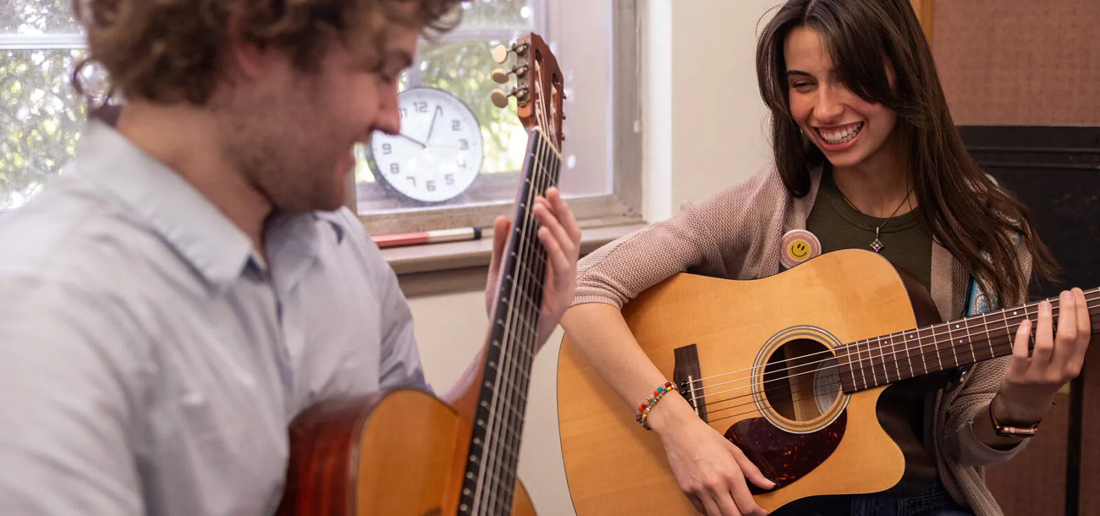 Guitar teacher and student during lesson