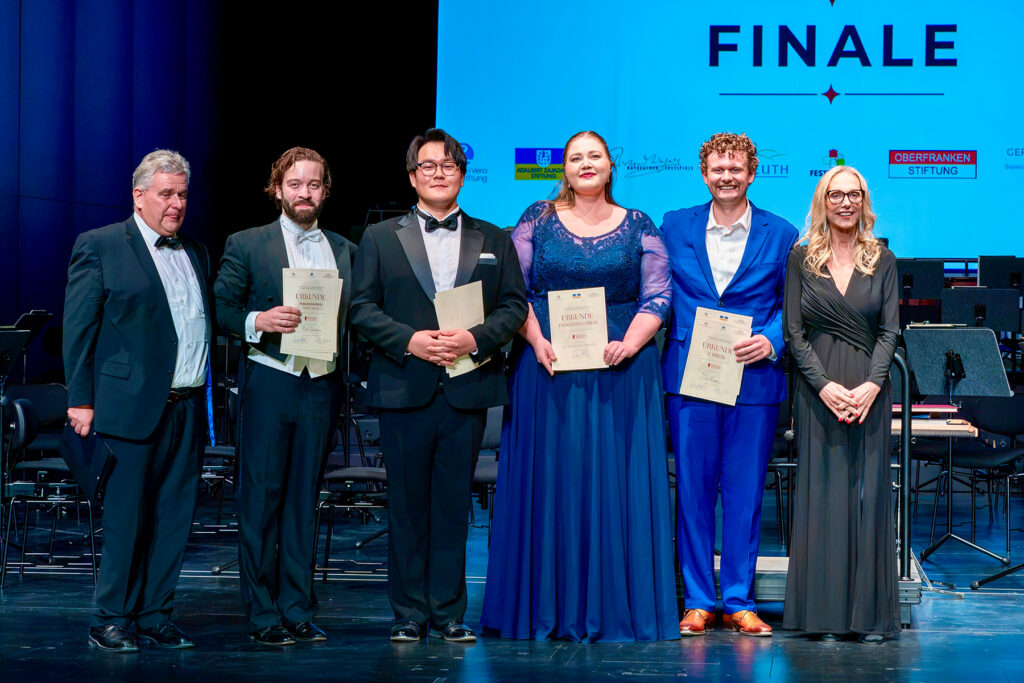 Contestants on stage after competition.